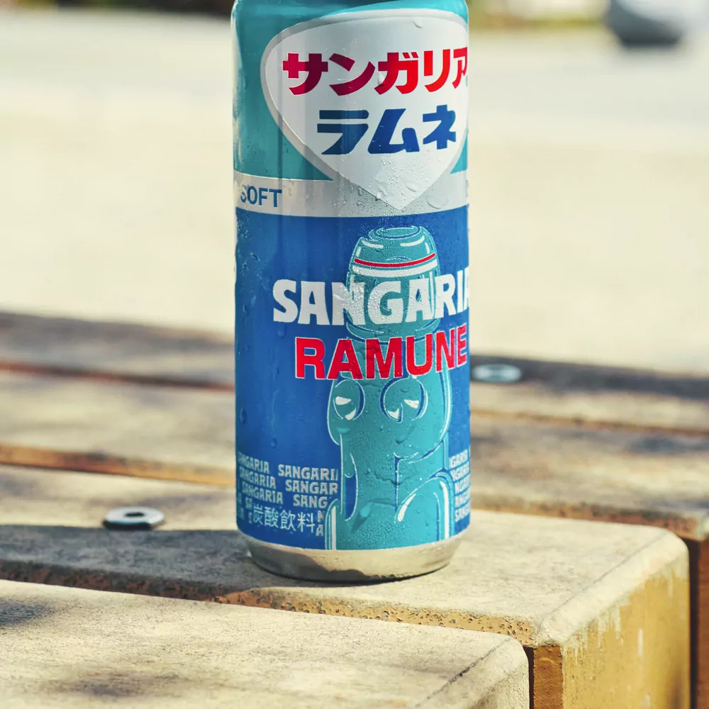 A can of Sangaria Ramune, a Japanese soda, on a wooden bench