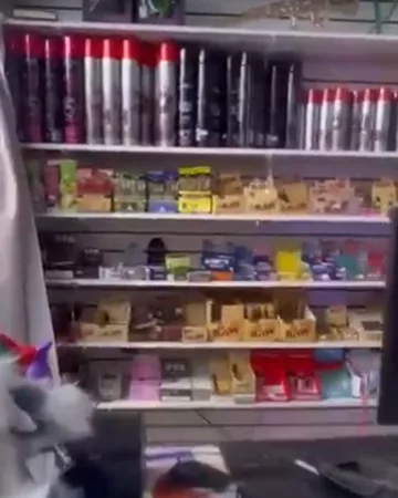 Rolling paper boxes and butane cans behind the counter